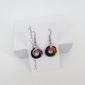 Handmade Progress Pride earrings, small love knot rainbow LGBTQ+ chainmail jewelry, inclusive pride gift
