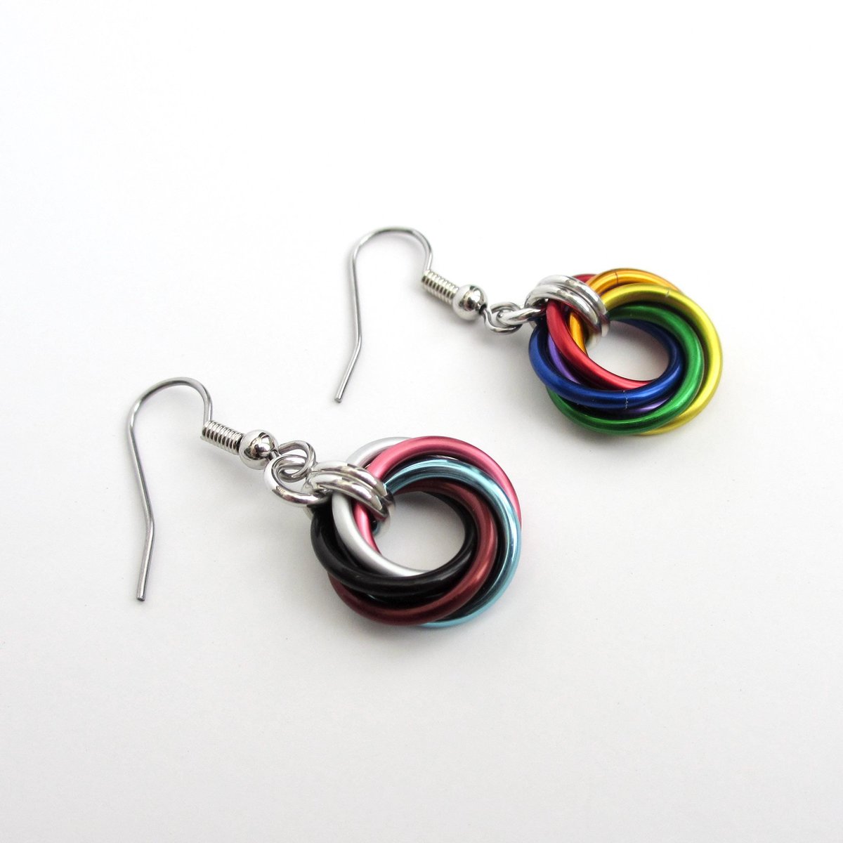 Handmade Progress Pride earrings, small love knot rainbow LGBTQ+ chainmail jewelry, inclusive pride gift