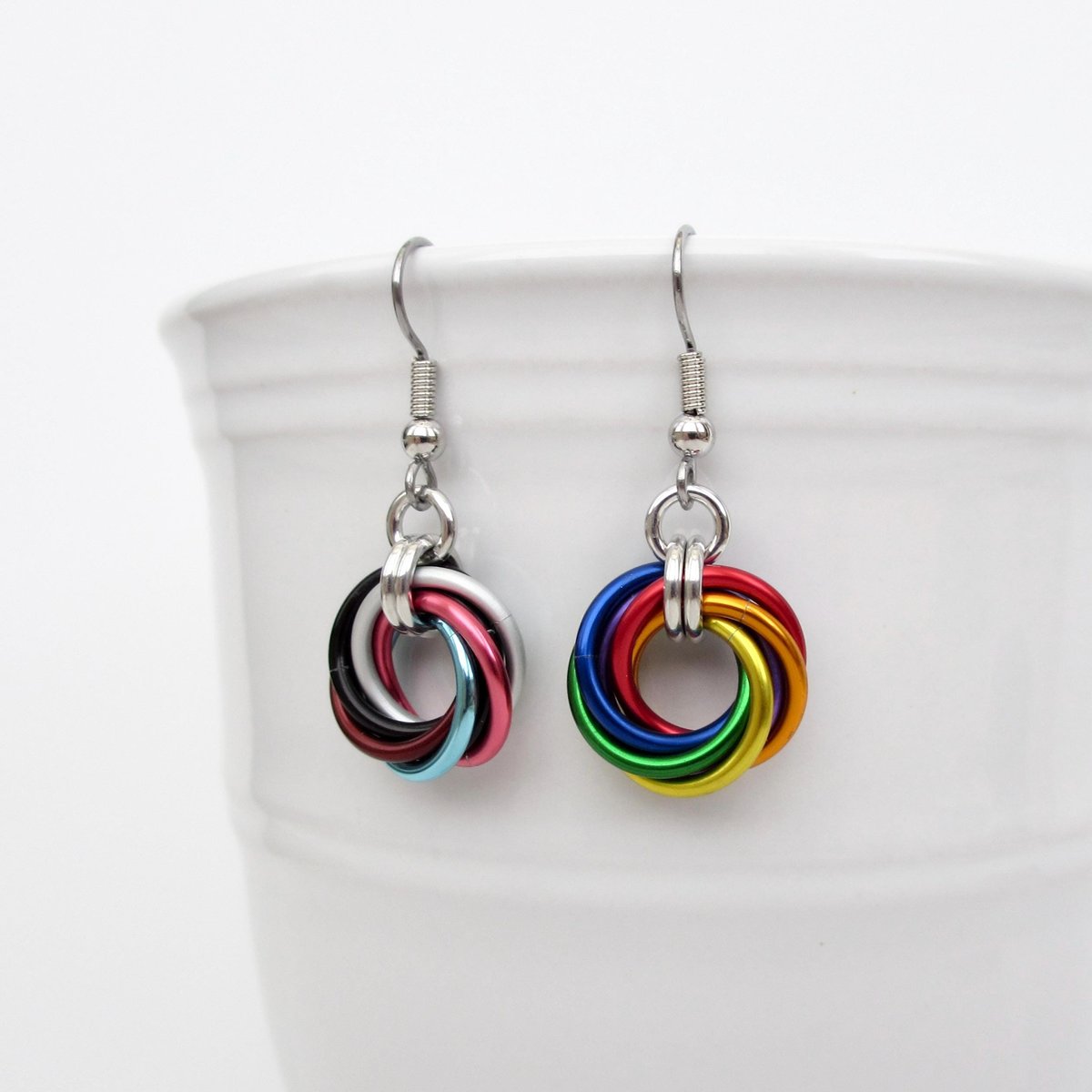 Handmade Progress Pride earrings, small love knot rainbow LGBTQ+ chainmail jewelry, inclusive pride gift