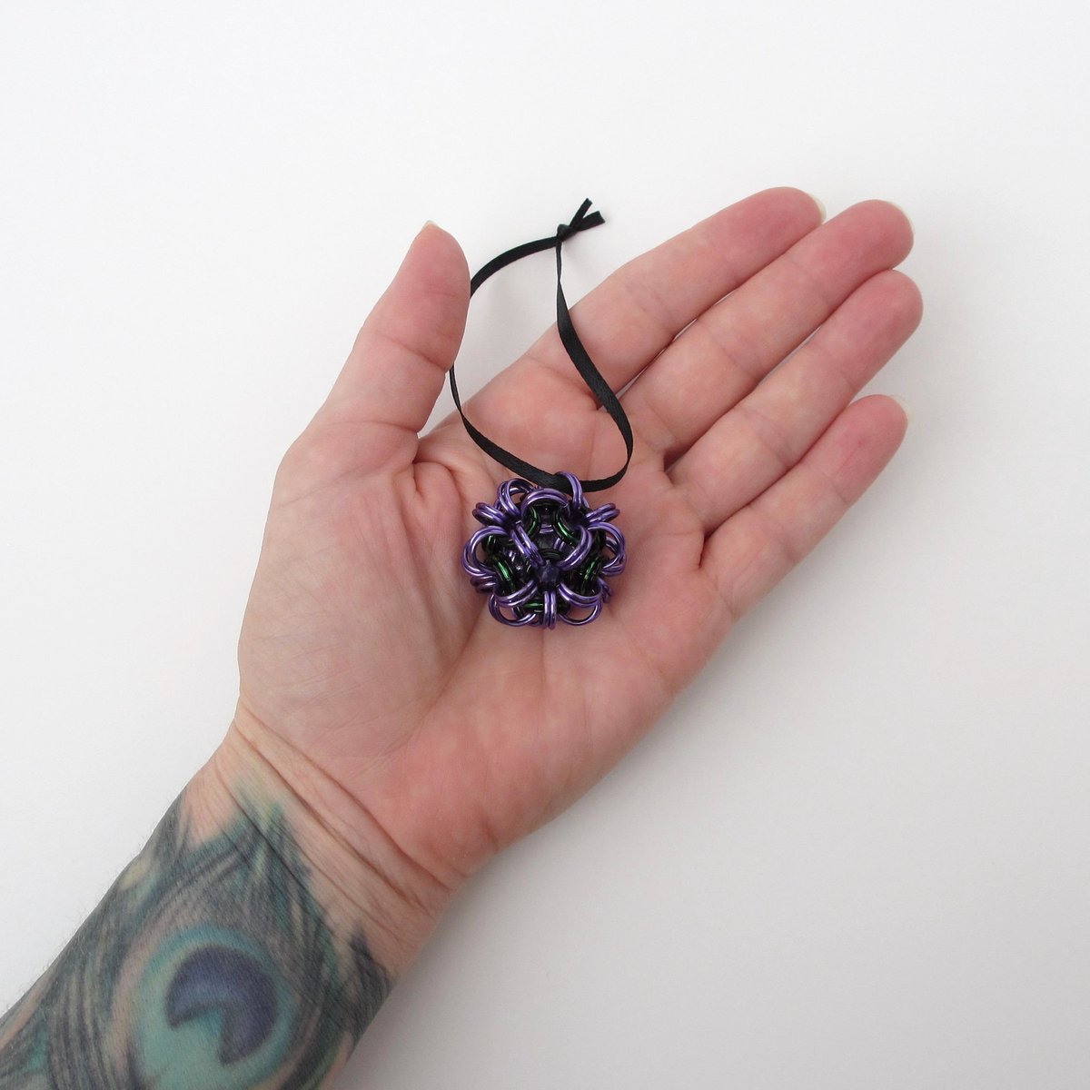 Halloween bag charm or mini ornament, handmade chainmail dodecahedron ball - purple, black, and green seasonal decoration