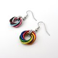 Handmade Progress Pride earrings, small love knot rainbow LGBTQ+ chainmail jewelry, inclusive pride gift