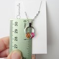 Minimalist Lesbian Pride Pendant with Floating Rings in Sunset Flag Colors - Handmade LGBTQ Jewelry