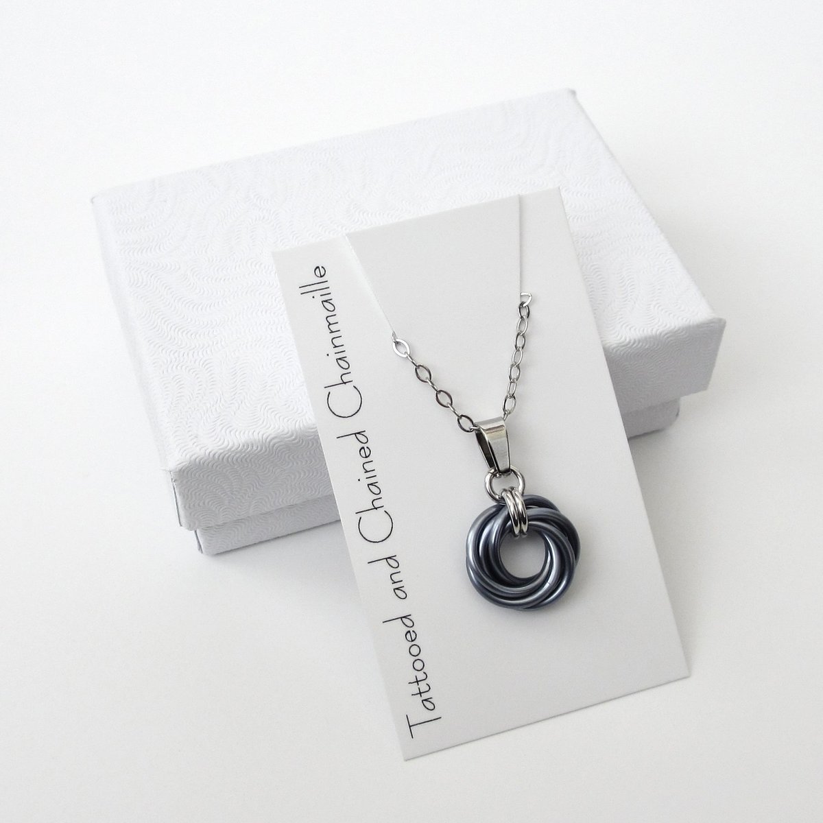 Gray pendant necklace, chainmail love knot, small circle minimalist jewelry