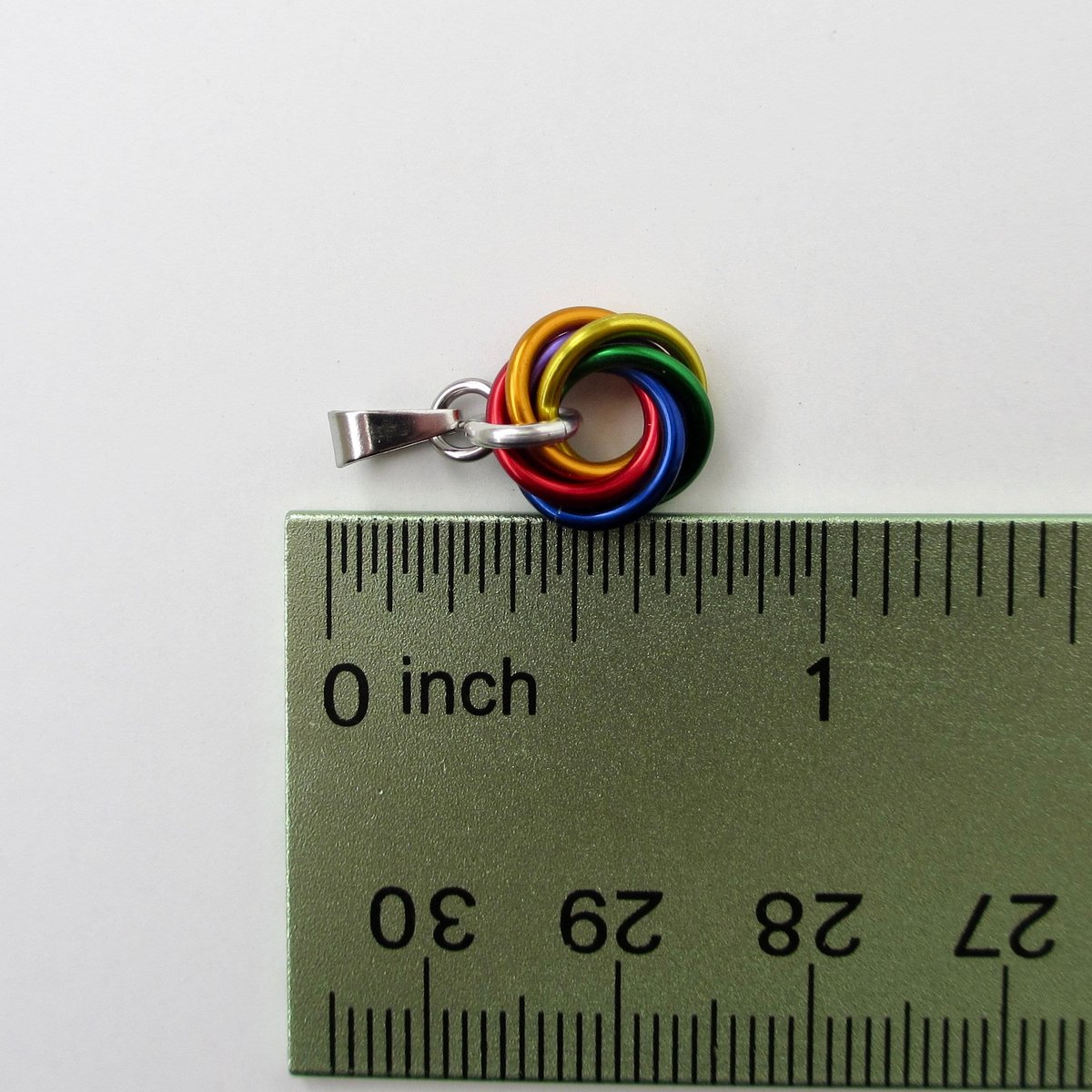 Tiny gay pride pendant, rainbow chainmail love knot, minimalist LGBTQ jewelry