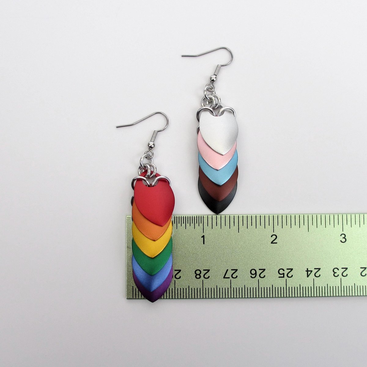 Progress pride flag earrings, mismatched LGBTQIA chainmail scales jewelry, lightweight anodized aluminum