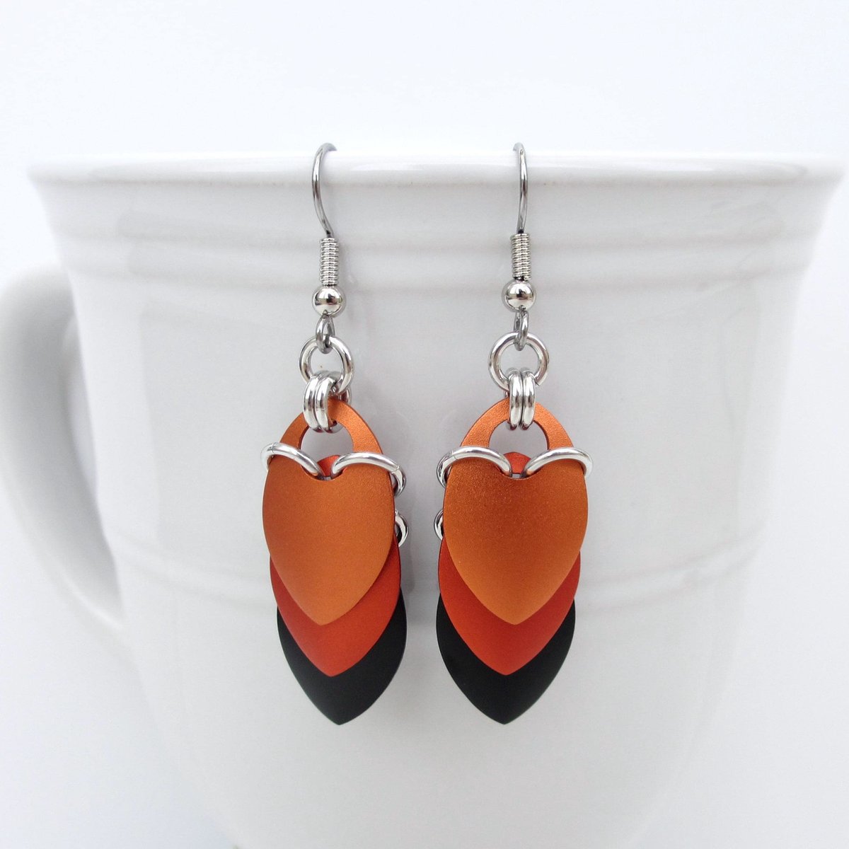 Autumn leaf earrings, chainmail scale fall jewelry in orange and black, Halloween accessories