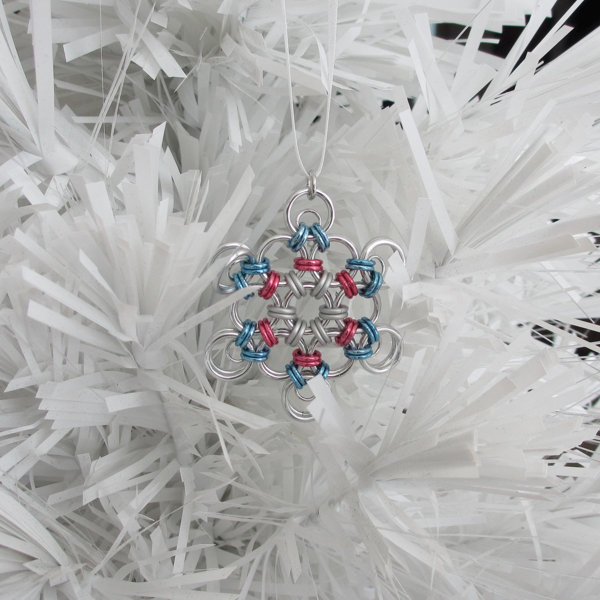 Transgender pride snowflake ornament, handmade chainmail holiday decoration in blue, pink and white