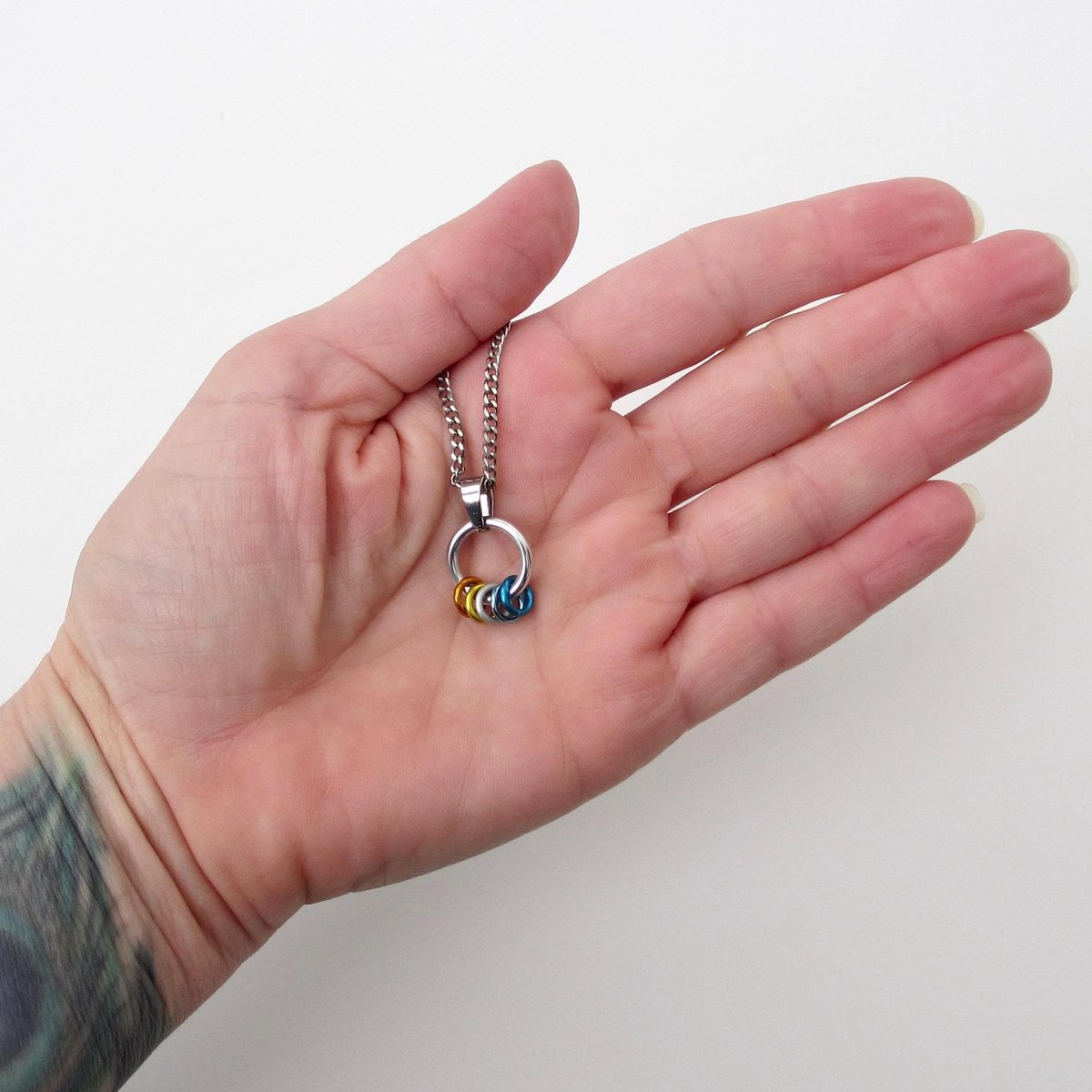 Minimalist Aroace Pride Pendant with Floating Rings in Orange, Yellow, White, Light Blue & Blue - Handmade LGBTQ+ Jewelry